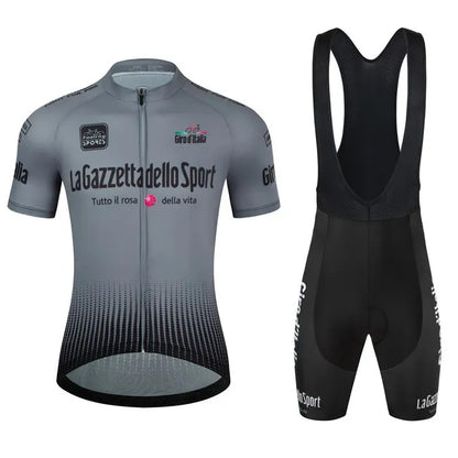 Loop short sleeve cycling suit in a patterned colour on a road bike, showing moisture-wicking fabric.
