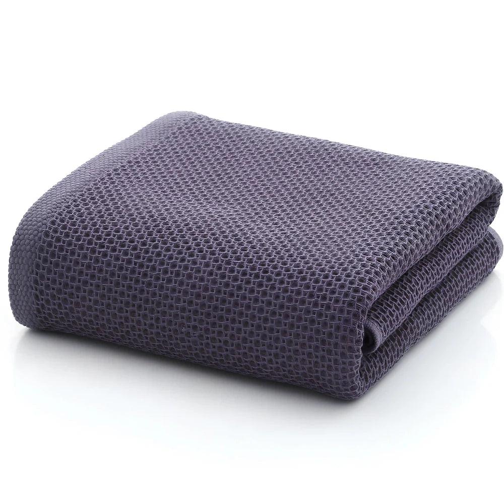 100% cotton honeycomb weave face towel in blue colour showing textured pattern and 70x140cm dimensions