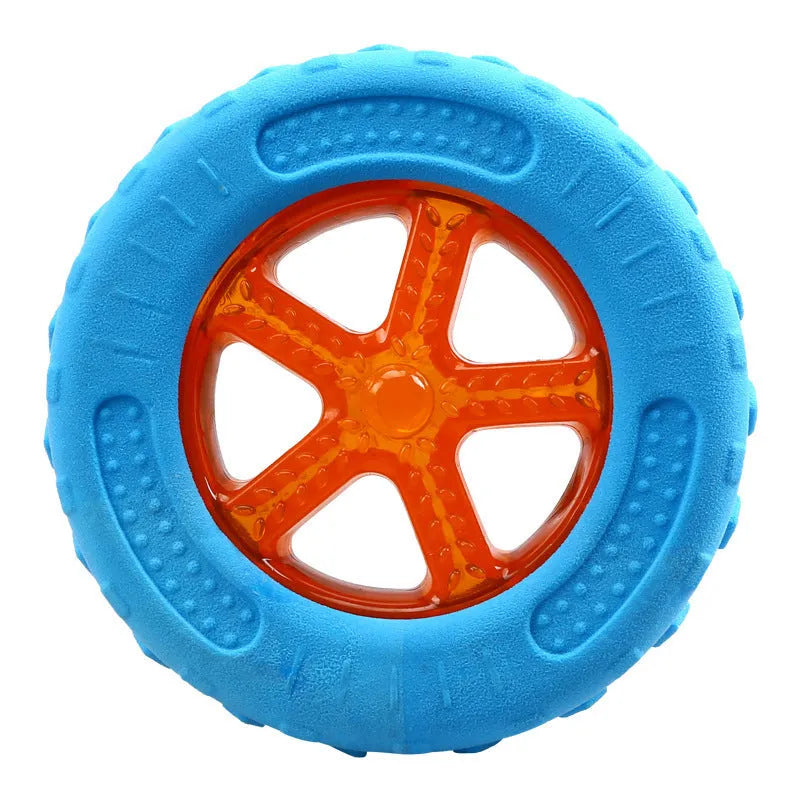 Three dog toys: blue ball, red barbell, and orange tire with bumpy textures for floating fetch games