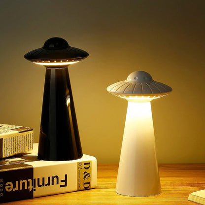 White UFO-shaped desk lamp with USB charging port and push-button switch