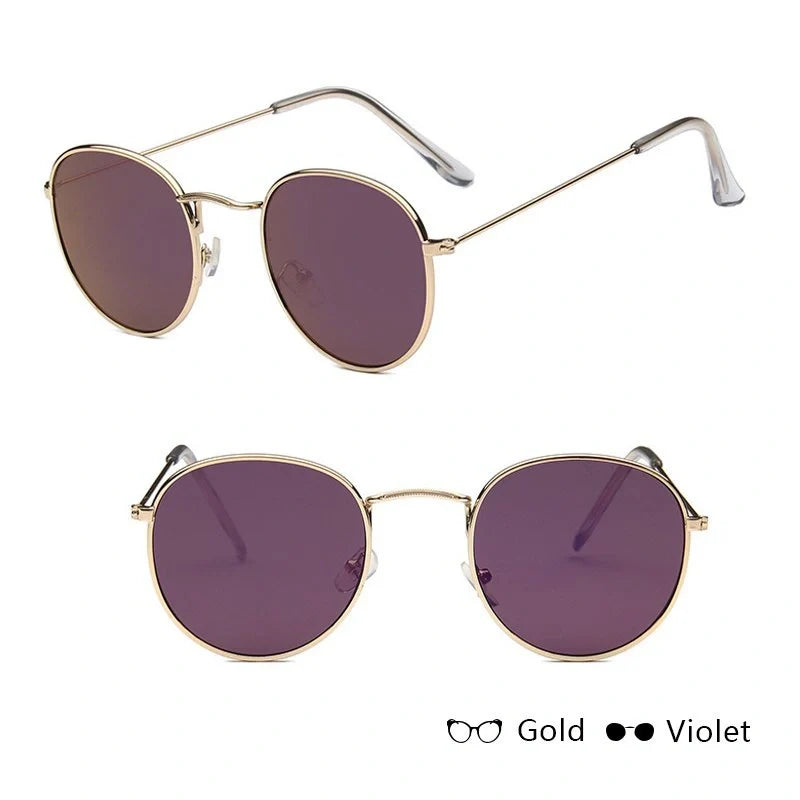 Stylish women's retro sunglasses with round frame and metal finish