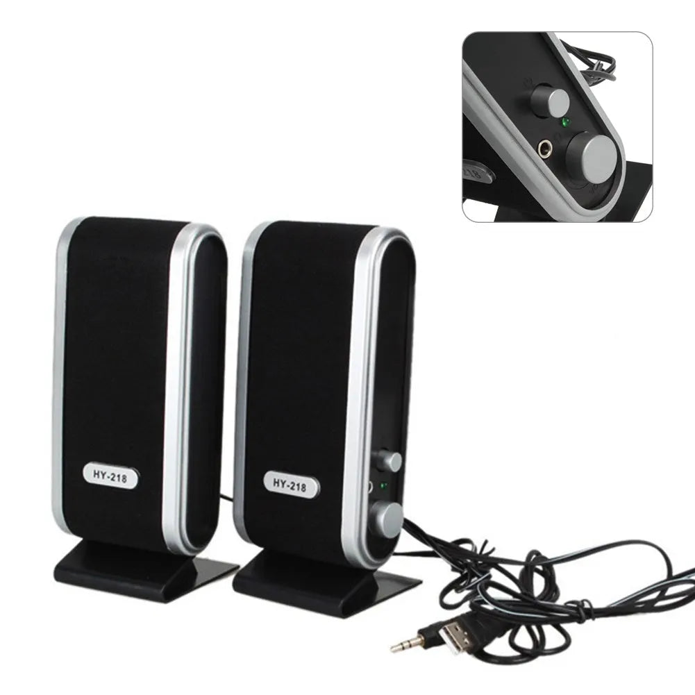 Black compact USB notebook mini speaker for laptop and computer audio enhancement.