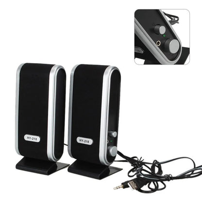 Black compact USB notebook mini speaker for laptop and computer audio enhancement.