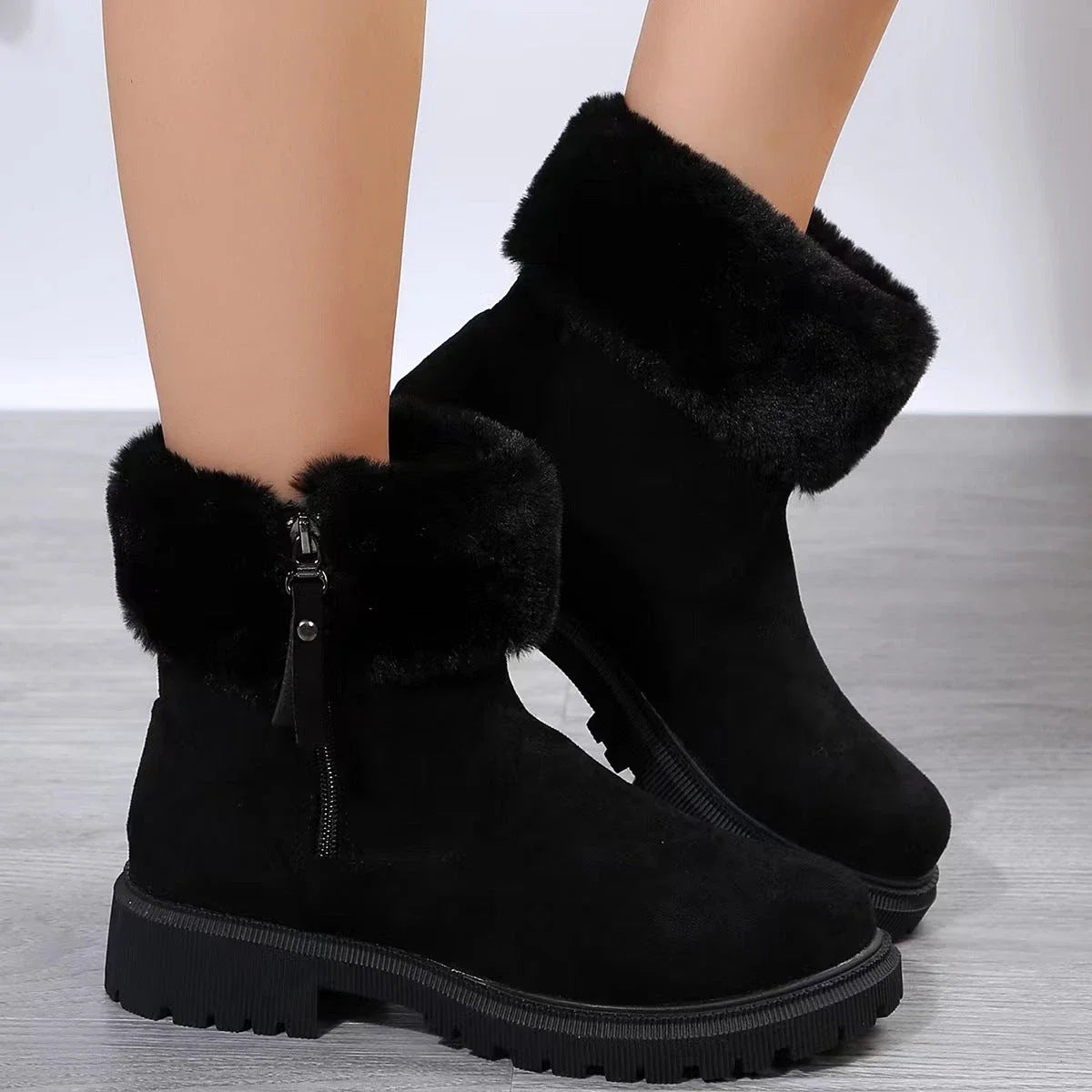 Cozy plush winter boots with side zipper closure, rubber sole, and suede upper in beige and black colors