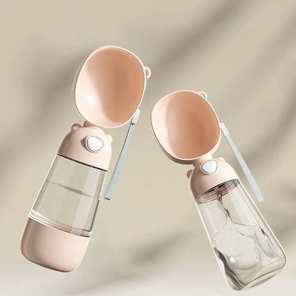 Portable pet water bottle with built-in food and water bowl for outdoor use