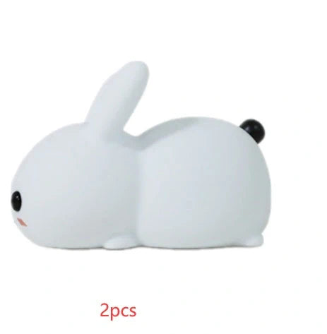 Enchanting silicone rabbit night light with warm and cool white dual-color lighting options, creating a cozy ambiance