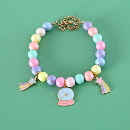 Adjustable resin pet collar with macaron designs in six colours, showing sizing from 15-38cm