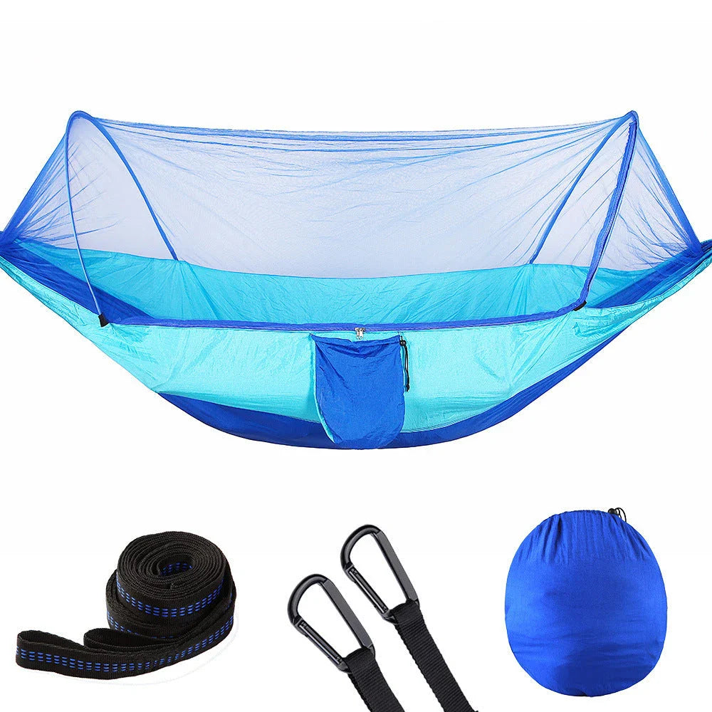 Cozy outdoor hammock with mosquito net for relaxing in nature and outdoor adventures