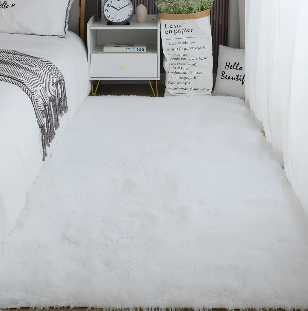 Tie-dyed variegated silk wool carpet floor mat showing organic colour patterns with polyester fibre suede backing