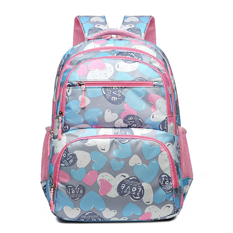 Student schoolbag with air pillow belt in blue, grey, pink, or rose red, made from Oxford cloth for burden reduction.