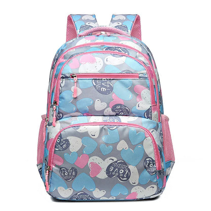 Student schoolbag with air pillow belt in blue, grey, pink, or rose red, made from Oxford cloth for burden reduction.