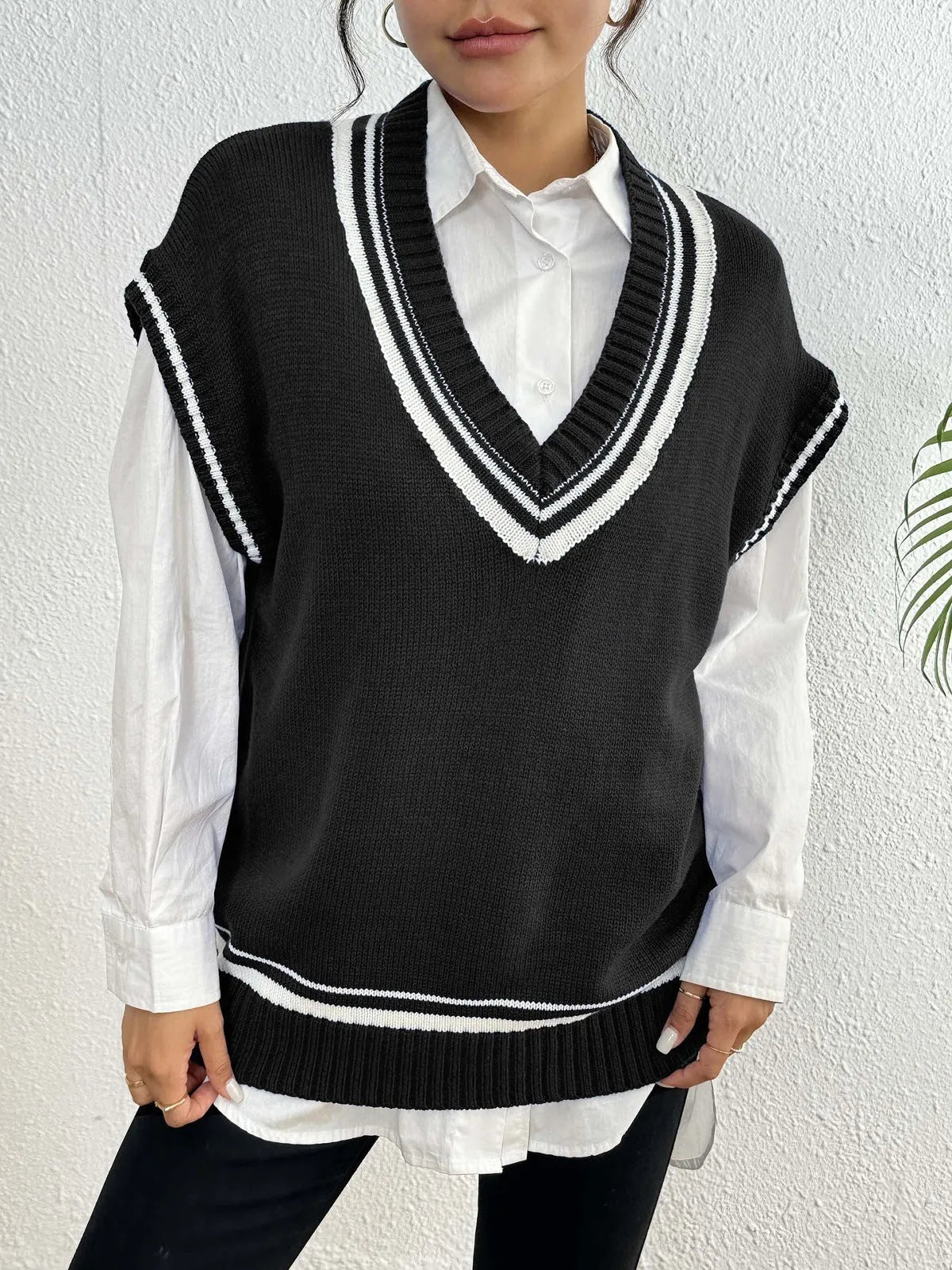 Women's college style acrylic pullover vest sweater in black, blue, and coffee colours with loose free size fit