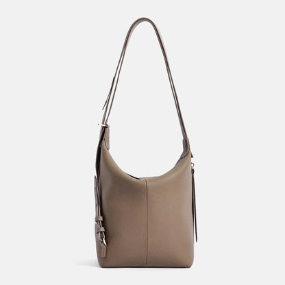 Women's genuine cowhide leather bucket bag in elephant grey colour showing soft texture and large capacity design