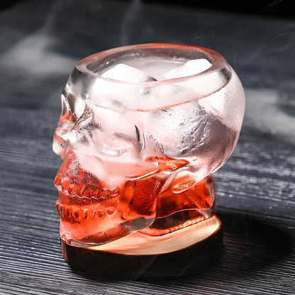 Transparent skull-shaped wine glass with detailed features and 160ml capacity measurement