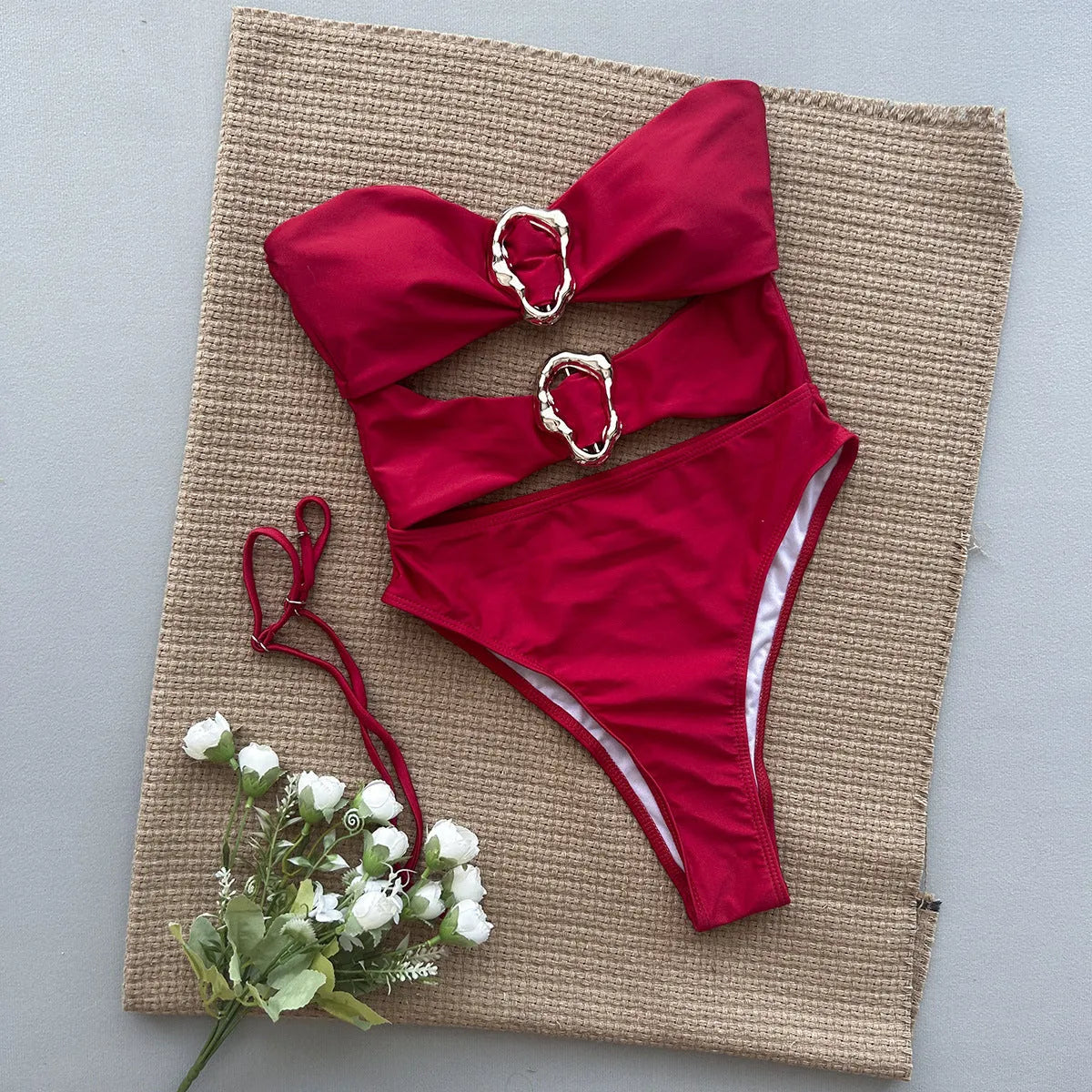Women's solid colour one-piece swimsuit in black, brown, or red with nylon spandex lining, sizes S M L