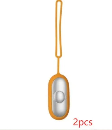 Hand-held micro-current sleep aid device in grey, green, and orange colour options
