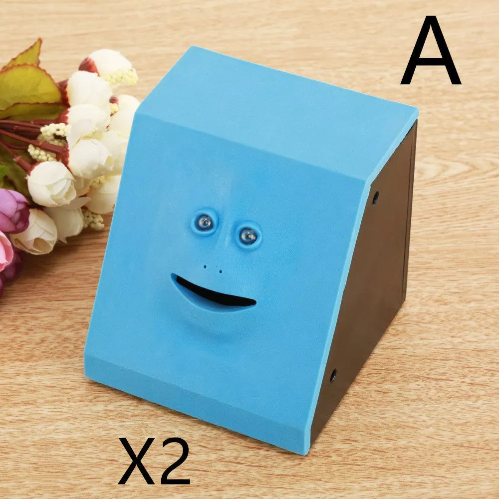 Face Intelligent Induction Electric Piggy Bank with realistic money-eating action in brick blue, pink, or red