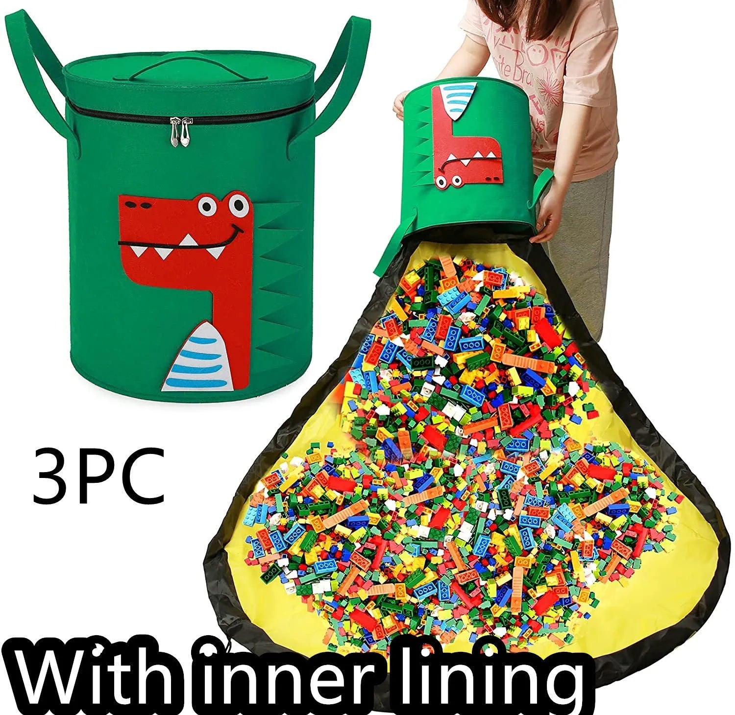 Green felt storage cube with pull rope unfolded into a large square play mat on a wooden floor.