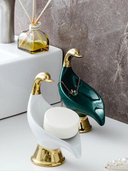 Ceramic swan soap rack in white and green with drainage cover