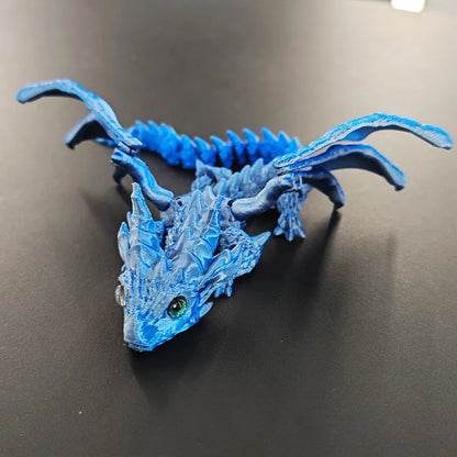 Red and gold 3D printed plastic dragon wings decoration for costumes.