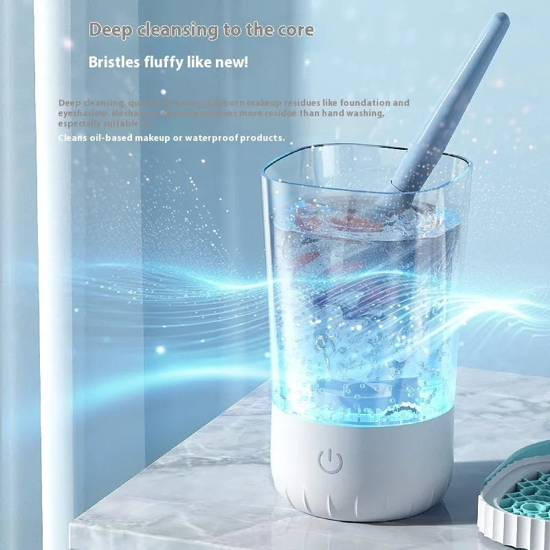 White rechargeable electric makeup brush cleaning device with USB cable, measuring 24cm length