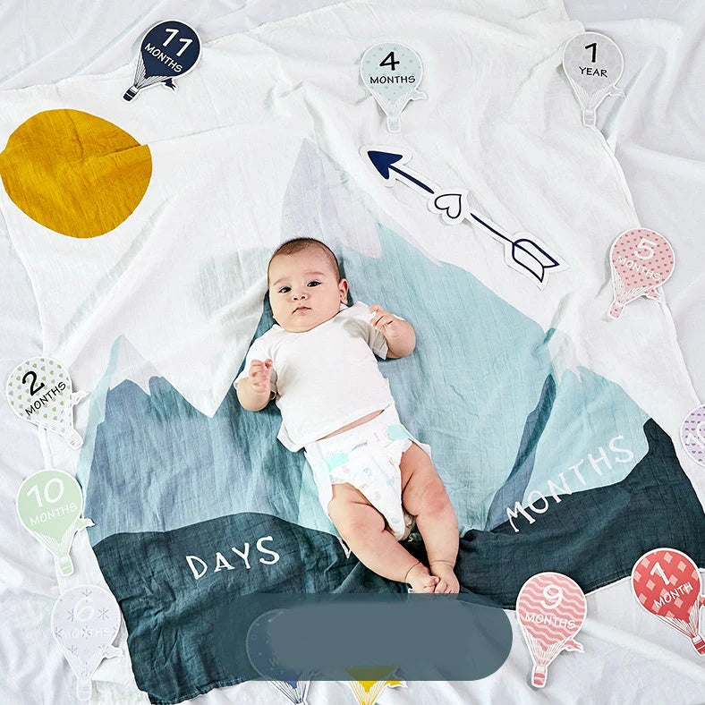 Cotton baby swaddle measuring 120x120cm with cartoon pattern in Rainbow colour option