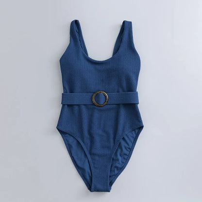 Navy blue women's one-piece swimsuit with triangle top and built-in chest pads for swimming