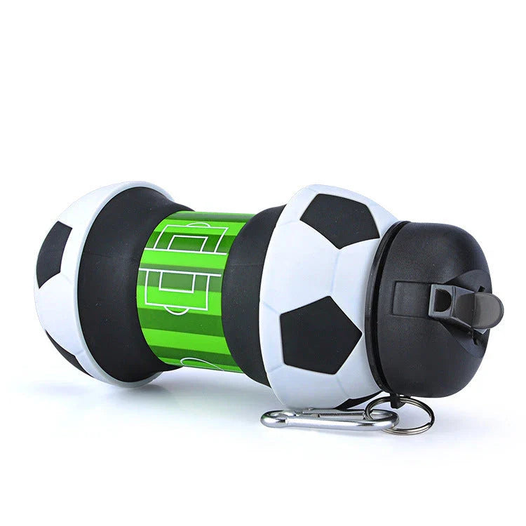 Collapsible soccer-shaped water bottle with straw, made of food-grade silicone for sports and travel hydration