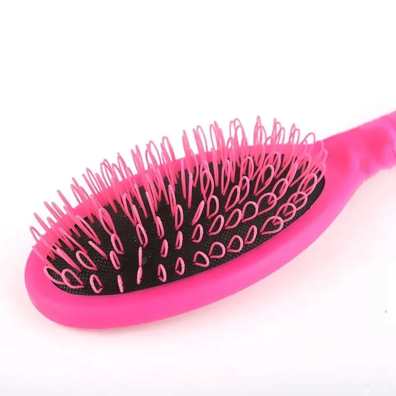 Black ring tooth hair extension comb with airbag design showing 22cm length