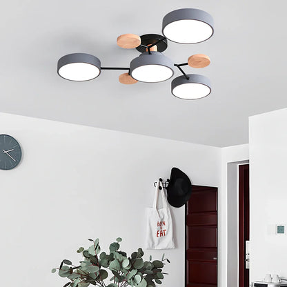 Modern round acrylic LED ceiling light with Scandinavian design in green, grey, or white colours