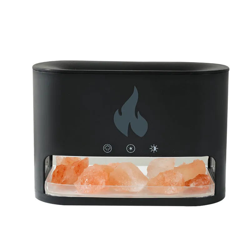 White square flame humidifier with colourful 3D light effect and crystal salt stone on a desk.
