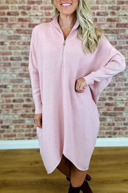 Women's solid colour loose fit knitted dress with raglan sleeves and a front zipper.