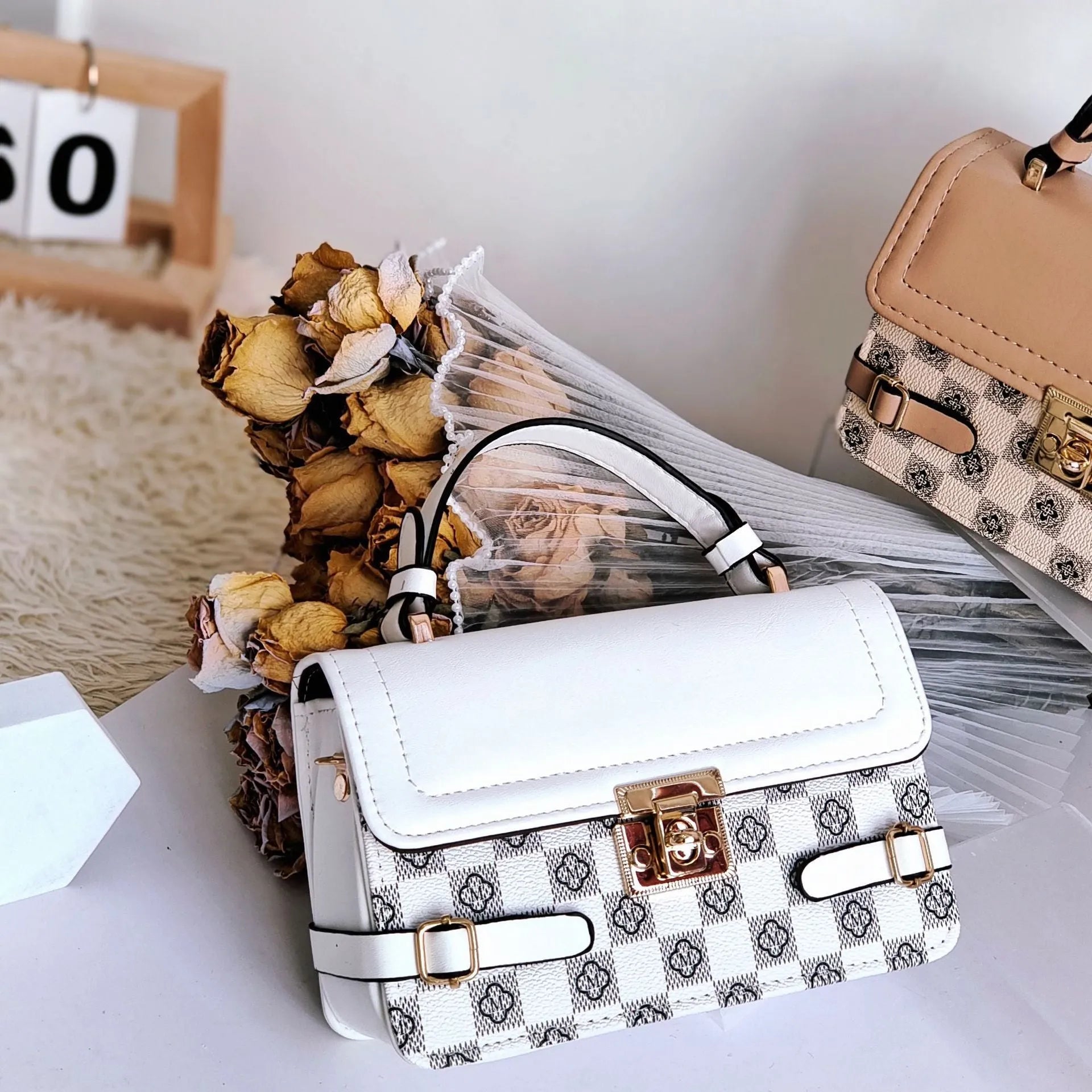 Retro square pattern crossbody bag in apricot colour showing 19.5x7.5x12cm dimensions and adjustable shoulder strap