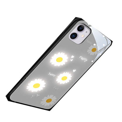 Luminous phone case with voice-activated colour lights showing painted daisy design on Apple iPhone