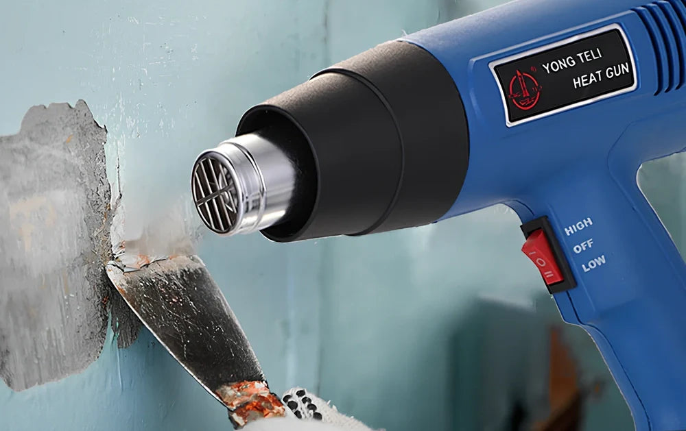 Industrial heat gun with temperature dial showing 300-500°C range, measuring 260mm long with gun mouth attachment