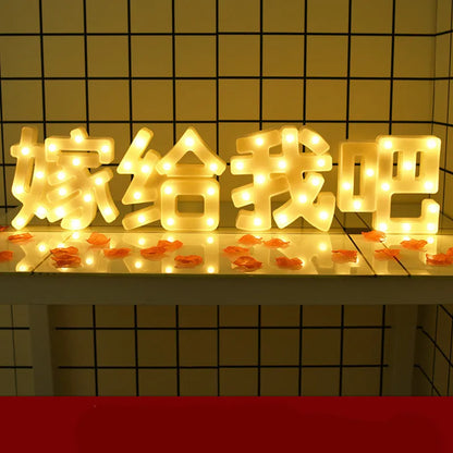 Plastic LED alphabet letter light spelling a message for a birthday or proposal.