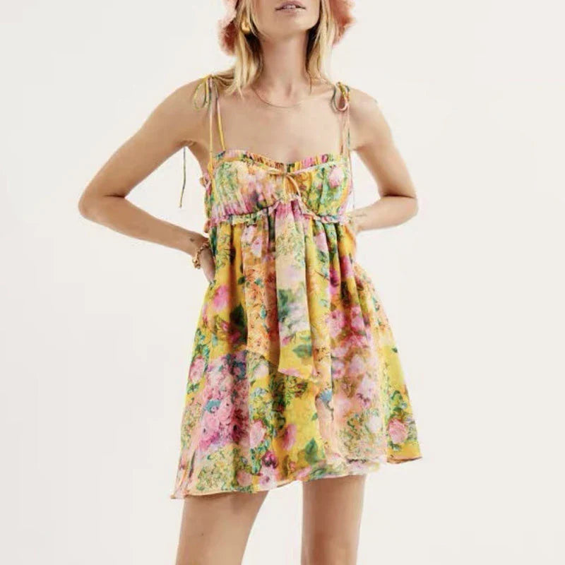Elegant floral suspender dress with adjustable straps and A-line silhouette, perfect for summer fashion