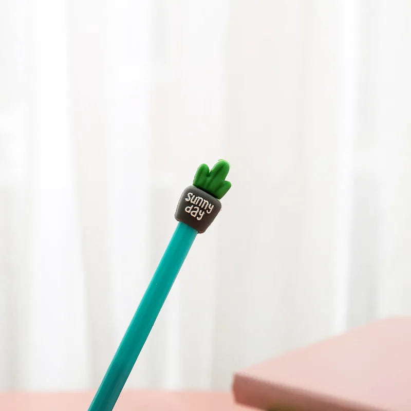 Potted cactus gel pen with silicone pot base, 0.5mm refill, approximately 18.5cm long, shown in Blue or Green.