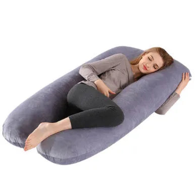 Large U-shaped pregnancy support pillow with removable cover and abdominal support belt.