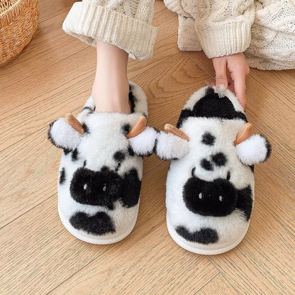 Cartoon cow plush slippers in black, leather red, and brown with non-slip soles