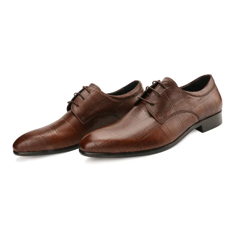 Men's black leather derby shoes with pointed toe, visible sewing details, and antiskid rubber soles