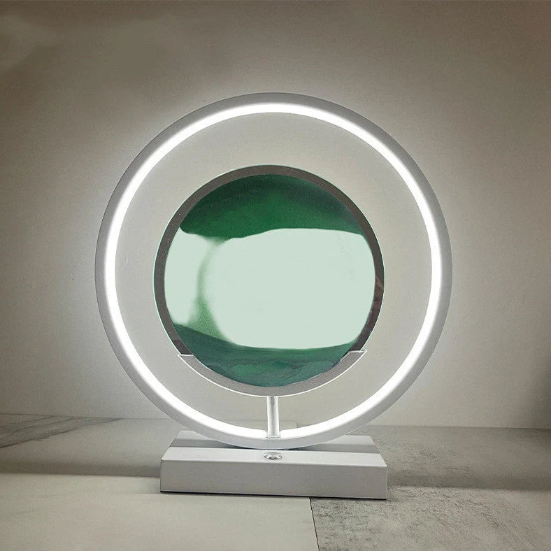 Creative minimalist quicksand table lamp with adjustable three-colour LED lighting on wooden surface