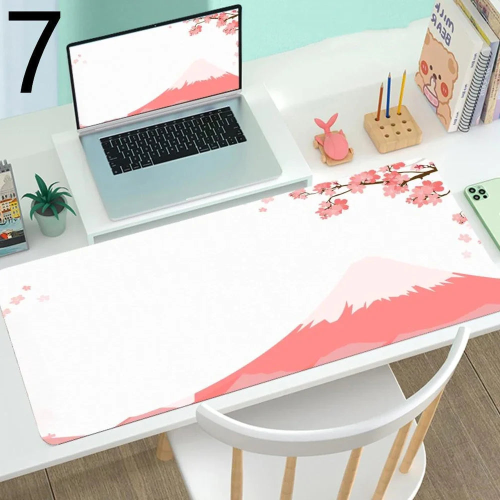 Large gaming mouse mat with printed design on rubber base, multiple size options from 300x600mm to 400x900mm