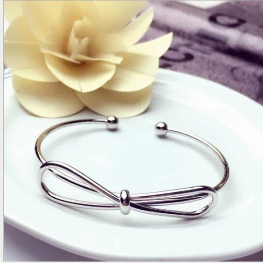 Elegant Knot O-Type Metal Openwork Bracelet with unique design for stylish women