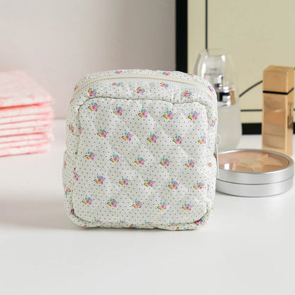 Women's key storage bag with floral patterns including cherry on white background design