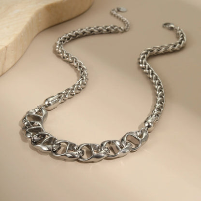 Gold plated stainless steel necklace with geometric pendant on regular chain