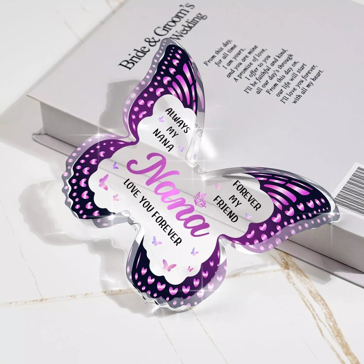 Butterfly-shaped acrylic keepsake with purple wing patterns and personalized message