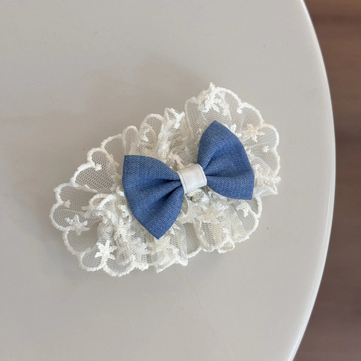 Cloth barrette hairpin set showing blue bow, beige lace, and pearl butterfly designs