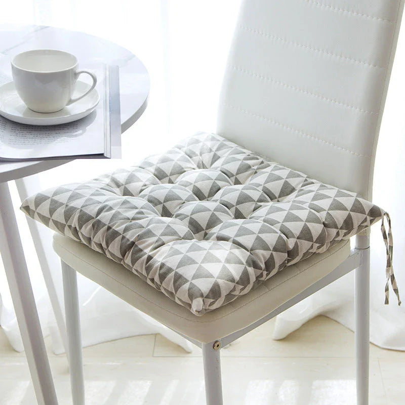 Comfortable Linen-Cotton Chair Cushion with a variety of vibrant patterns and designs, perfect for indoor and outdoor use.