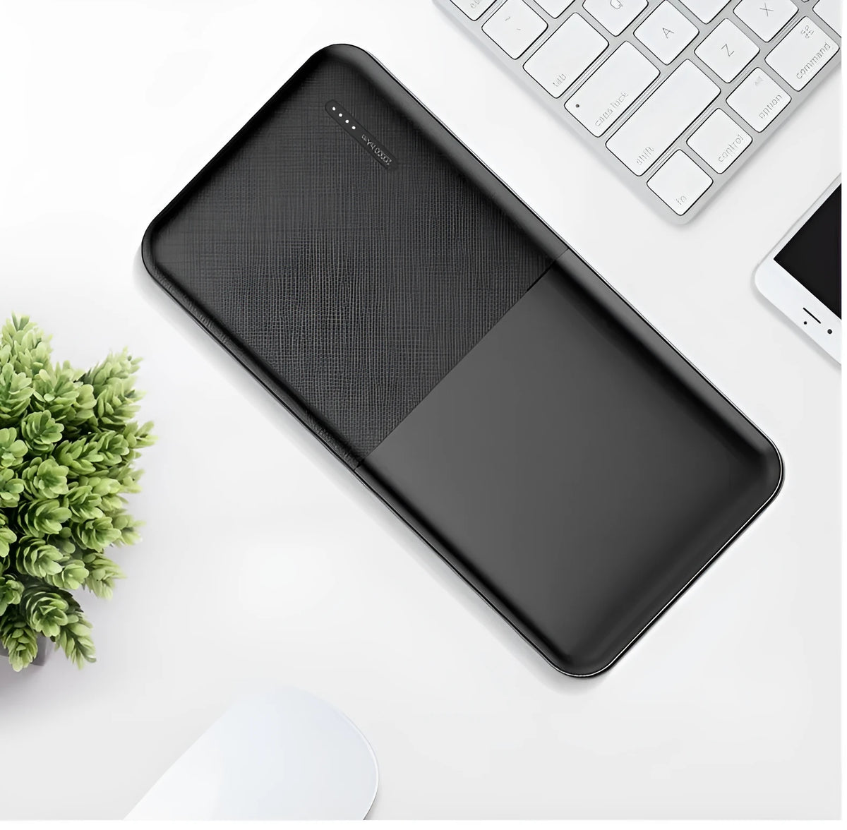 Black and white 20000 mAh power bank with heating function showing multi-USB ports